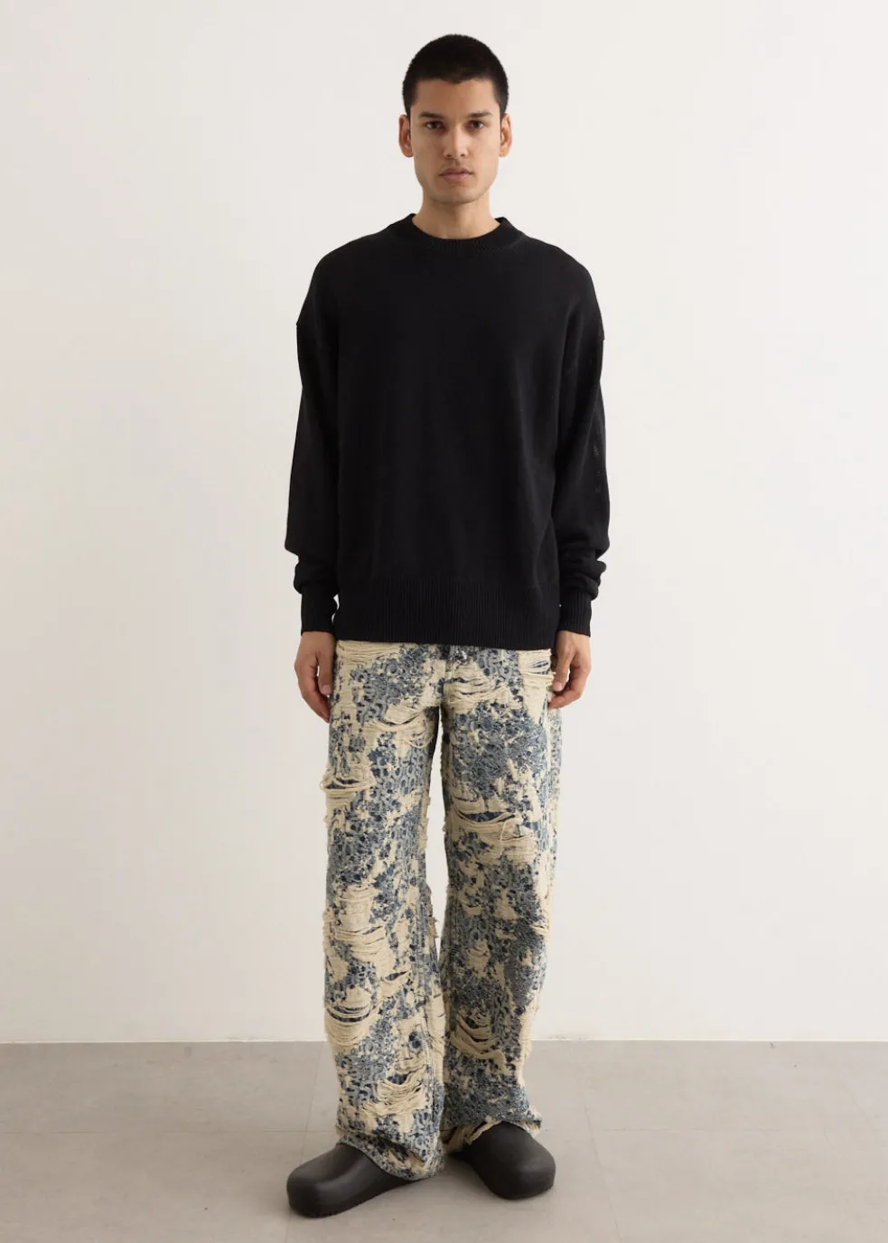 1981U Distressed Monogram Denim Jeans